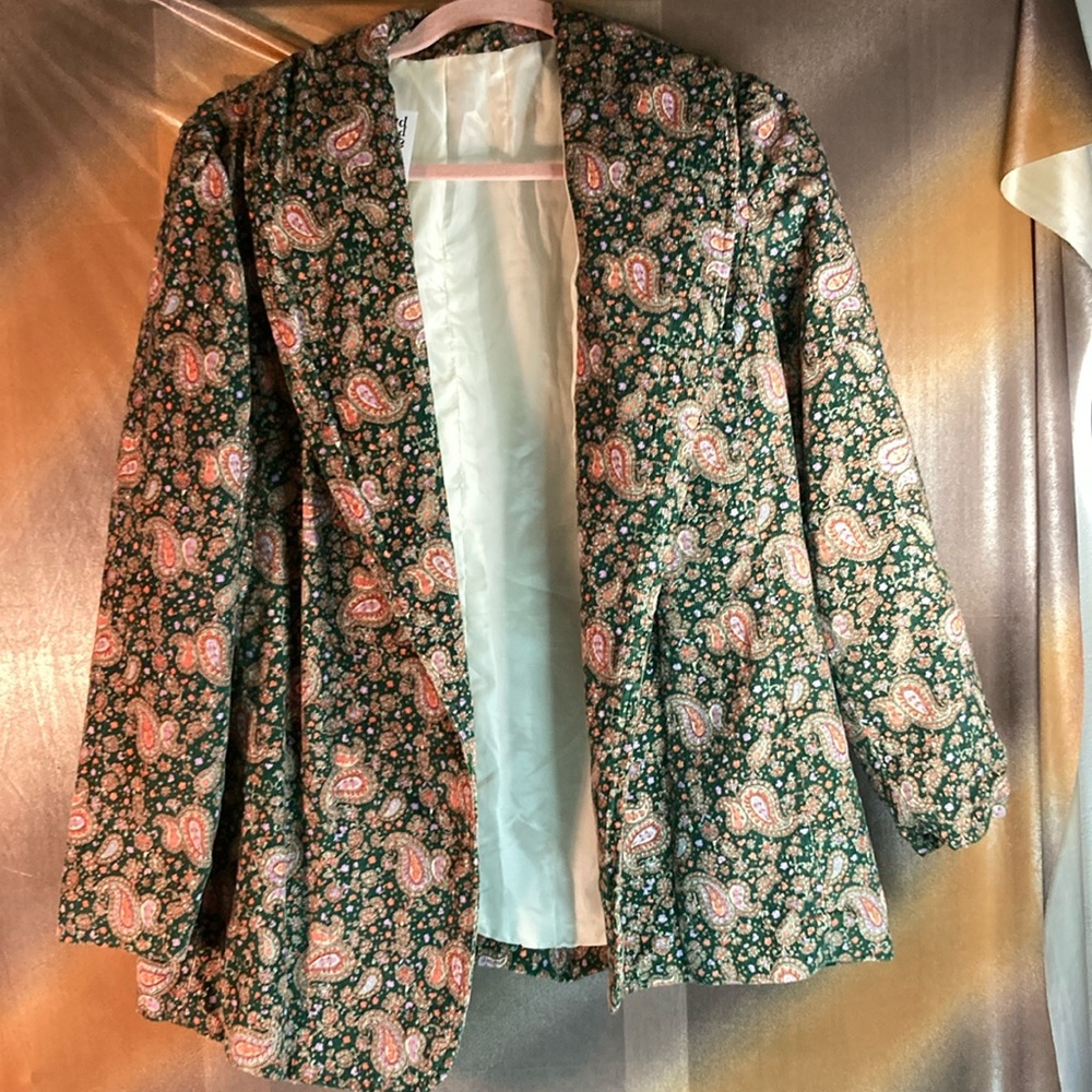 70’s vintage green corduroy paisley jacket with rolled collar. 44” chest 352